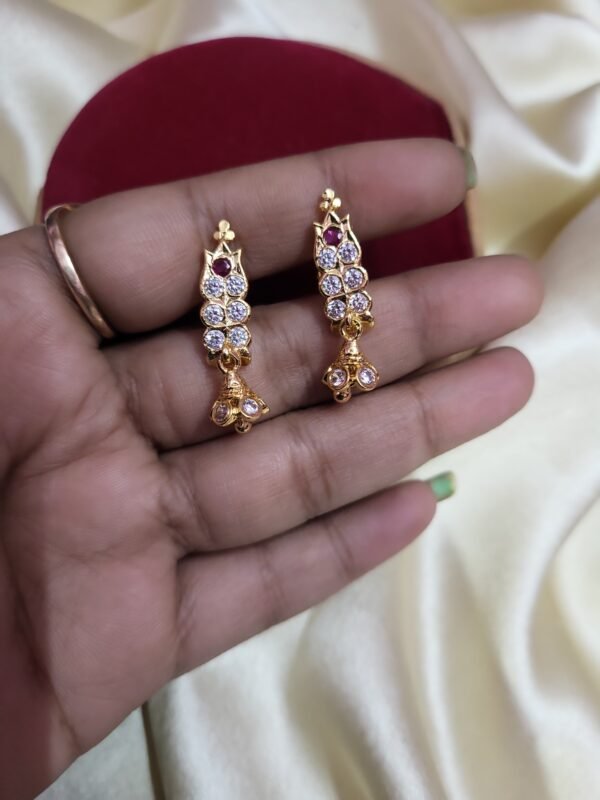 panchaloha earings with gold polish